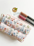 Our Lady of Lourdes Puffer Pouch